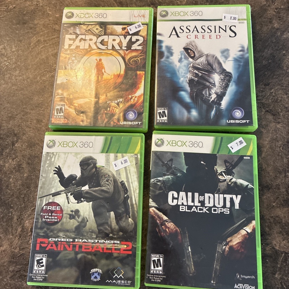 Lot Of 4 Xbox 360 Games Paintball, Far cry, Assassin Creed, Call If Duty Black O